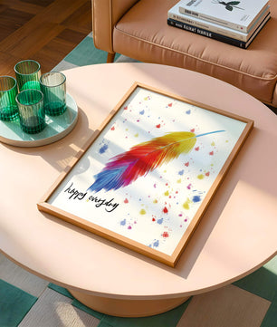 Colorful feather with inspirational message on abstract paint splatter background