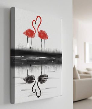 Flamencos elegantes reflejándose en el agua con un contraste artístico