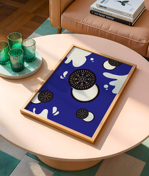 Graphic design featuring cookies and milk splashes on blue background