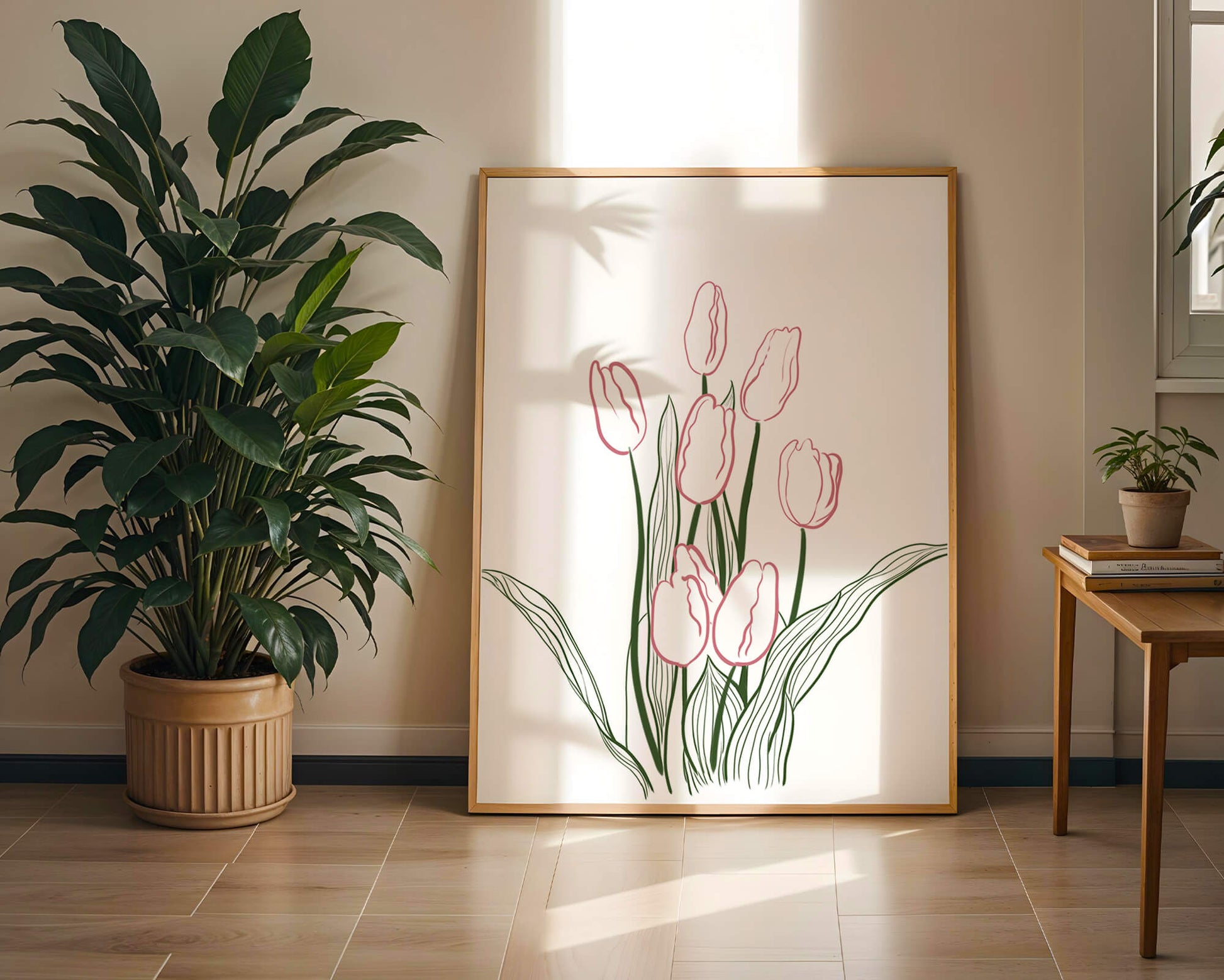 Wunderschöne rosa Tulpen mit grünen Blättern auf einer minimalistischen Leinwand