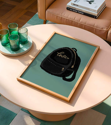 Elegant black backpack with gold accents and love inscription