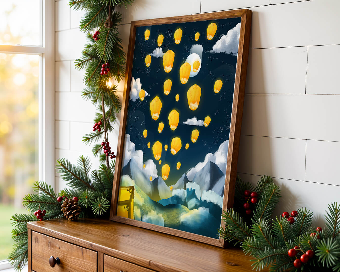 Lanterns floating in a starry night sky over mountains