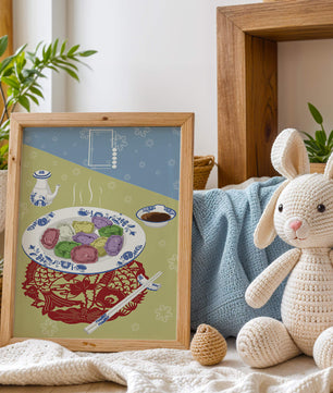 Colorful dumplings and tea set on decorative mat