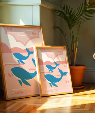 Playful whales illustration in pastel pink and blue