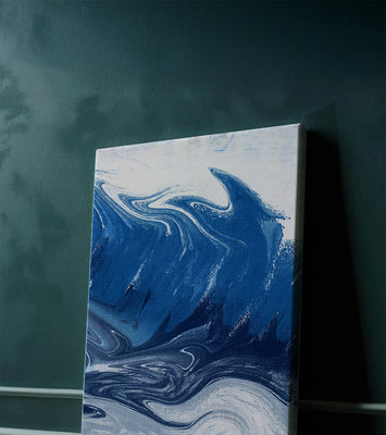 Abstract blue and white ocean wave painting with swirling patterns