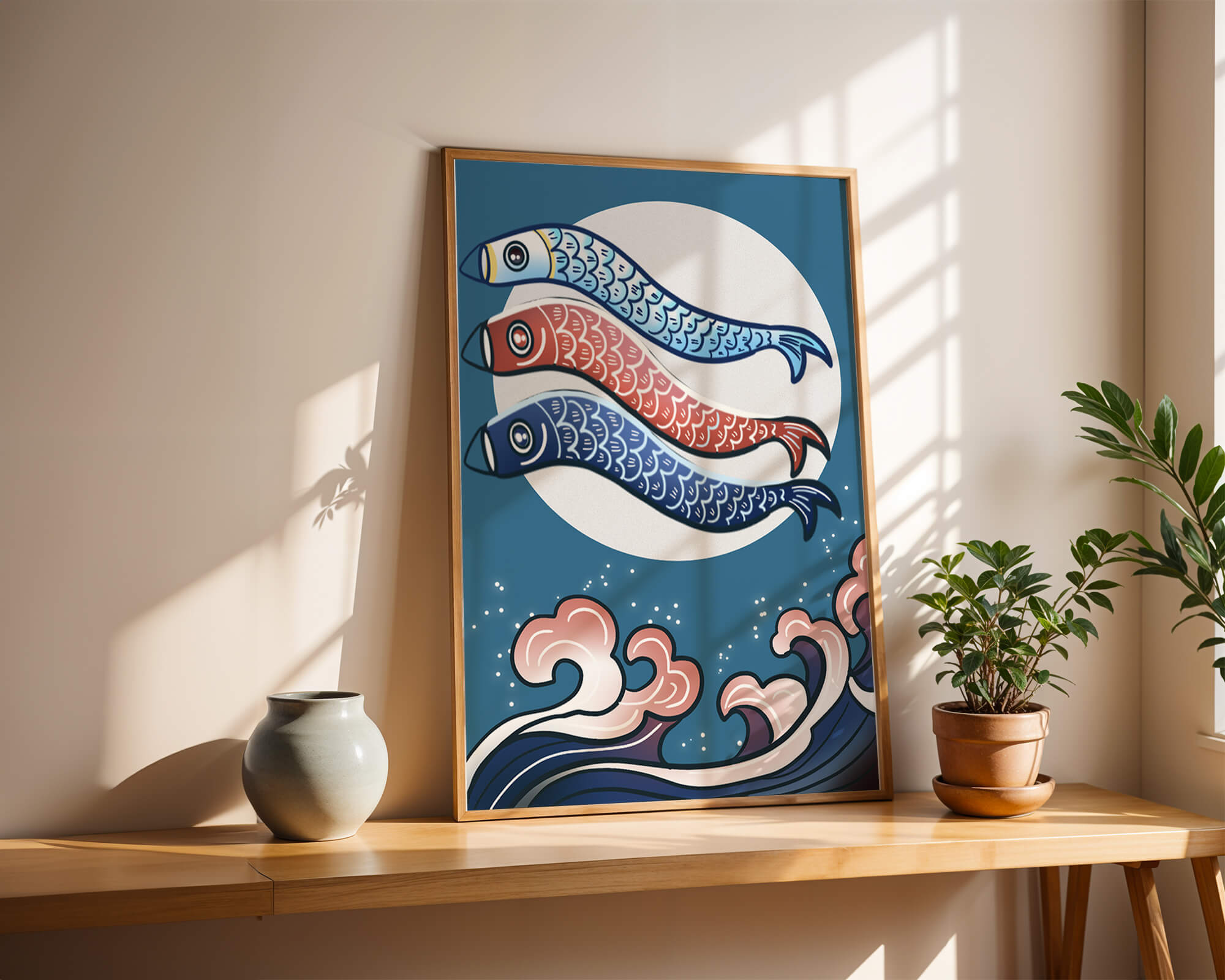 Colorful koi fish kites against a full moon with ocean waves
