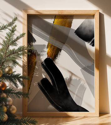 Abstract art piece with gold and black brushstrokes on a gray background
