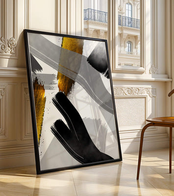 Abstract art piece with gold and black brushstrokes on a gray background
