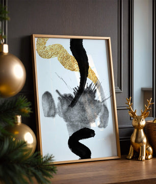 Abstract black and gold brushstrokes with textured patterns