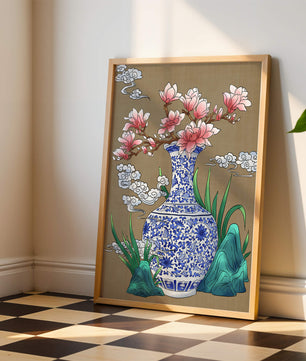 Arreglo floral elegante en un jarrón de porcelana azul y blanco con magnolias