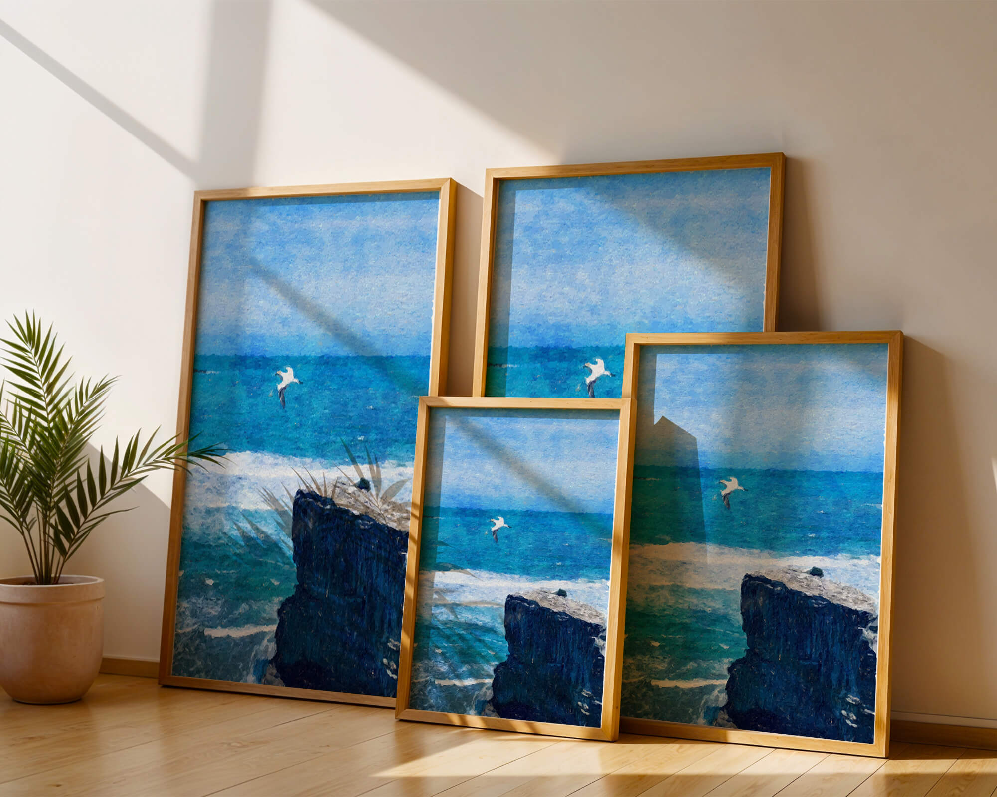 Seascape with soaring seagull over rocky cliff and ocean waves