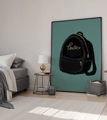 Elegant black backpack with gold accents and love inscription
