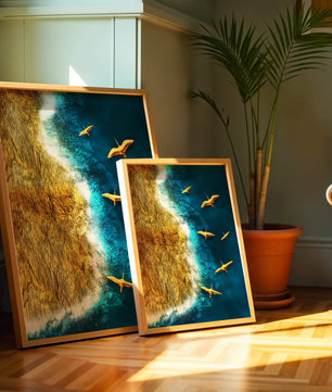 Golden beach landscape with vibrant ocean and flying seabirds