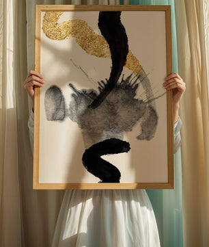 Abstract black and gold brushstrokes with textured patterns