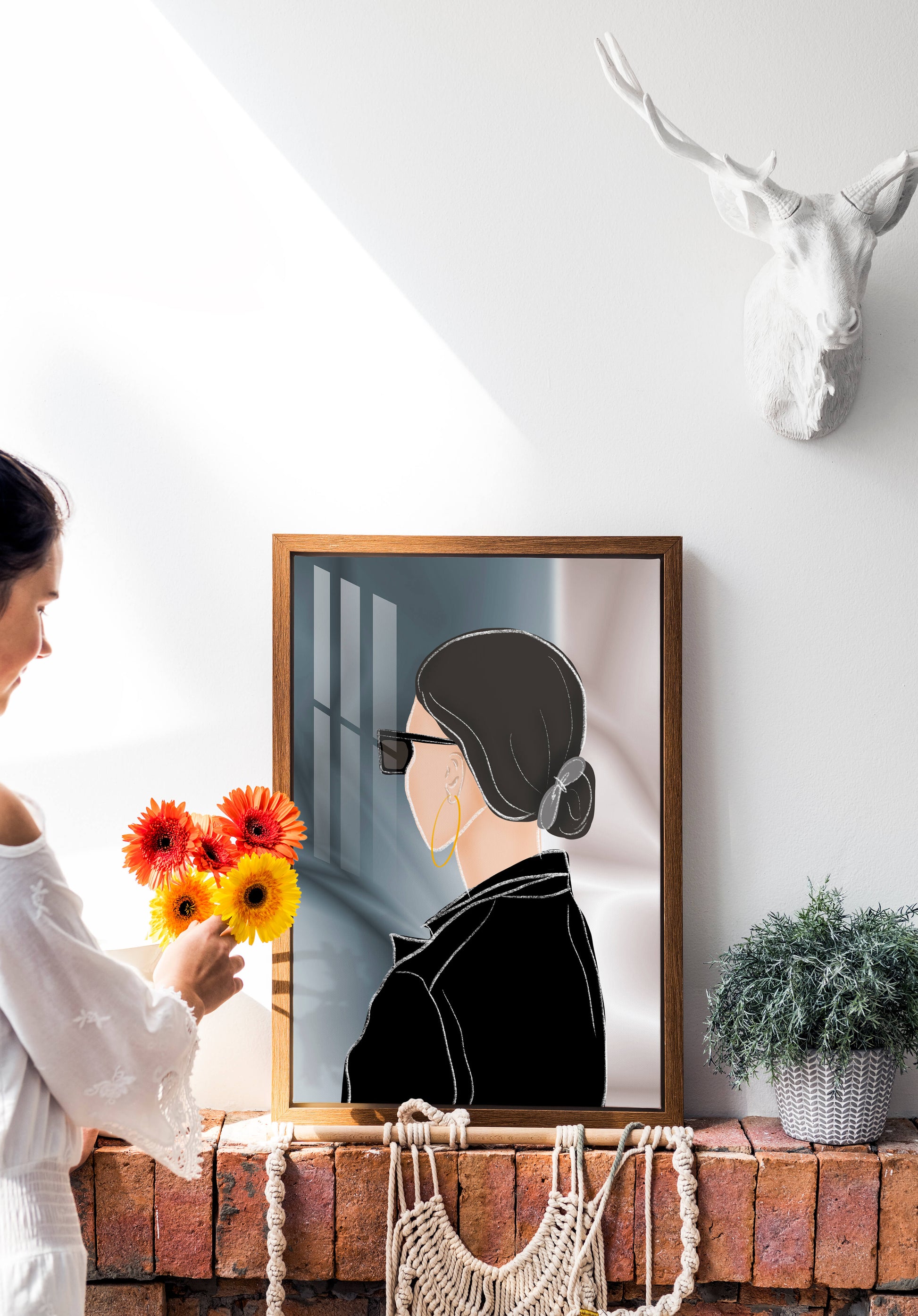 Modern woman with sunglasses and gold hoop earrings