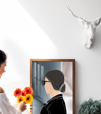 Modern woman with sunglasses and gold hoop earrings