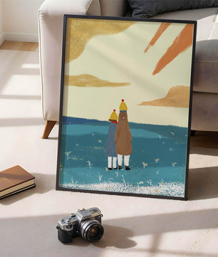 Two figures in winter clothing on a serene beach