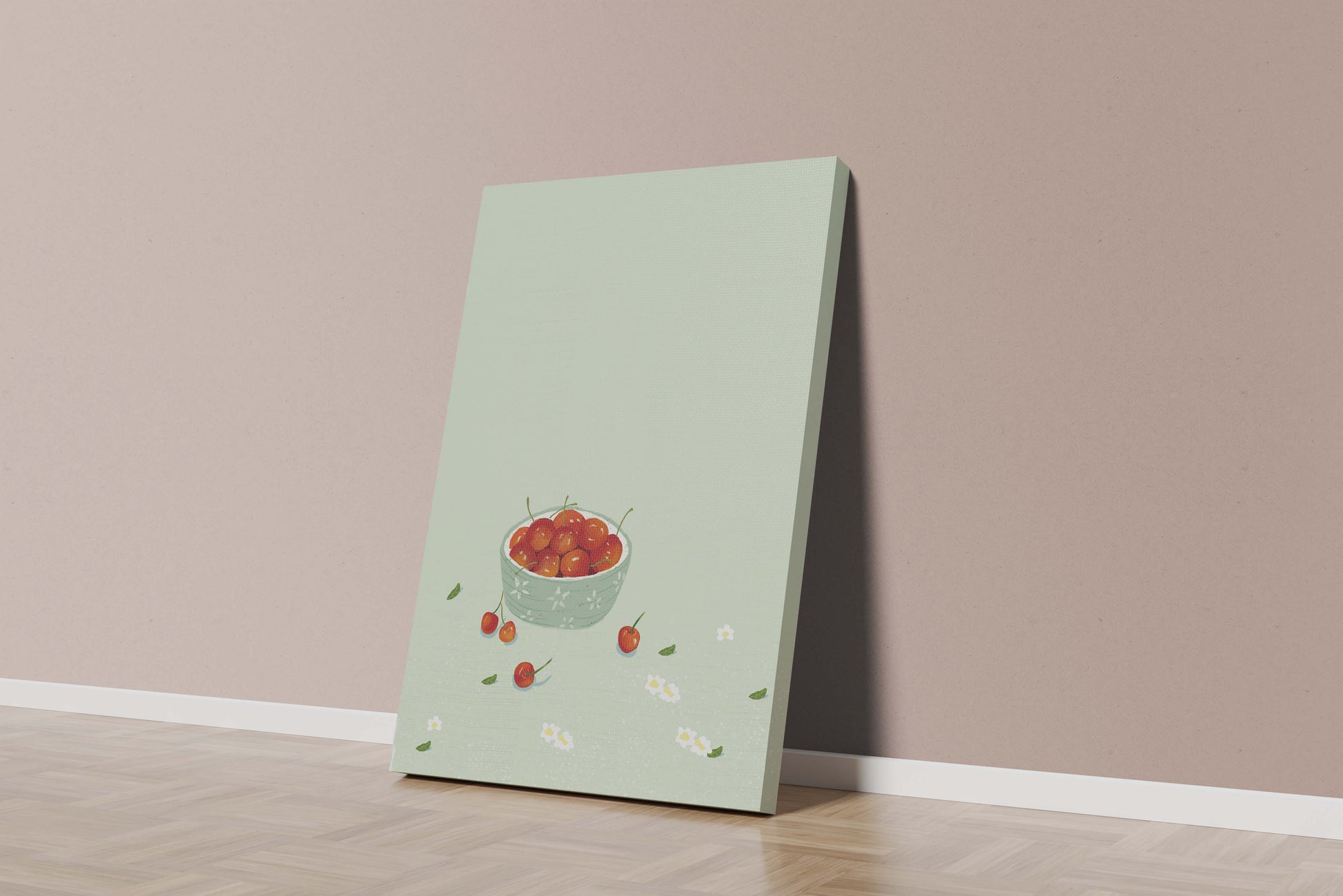 Cherries in a decorative bowl with floral accents on a soft green background