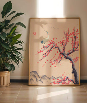 Elegant crane on cherry blossom tree with mountainous background