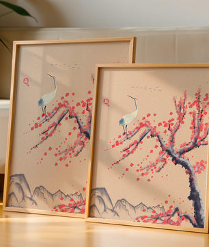 Elegant crane on cherry blossom tree with mountainous background