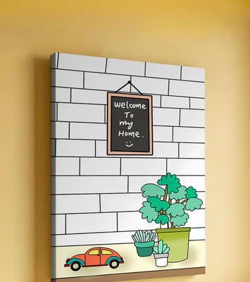 Chalkboard welcome sign with potted plants and a toy car
