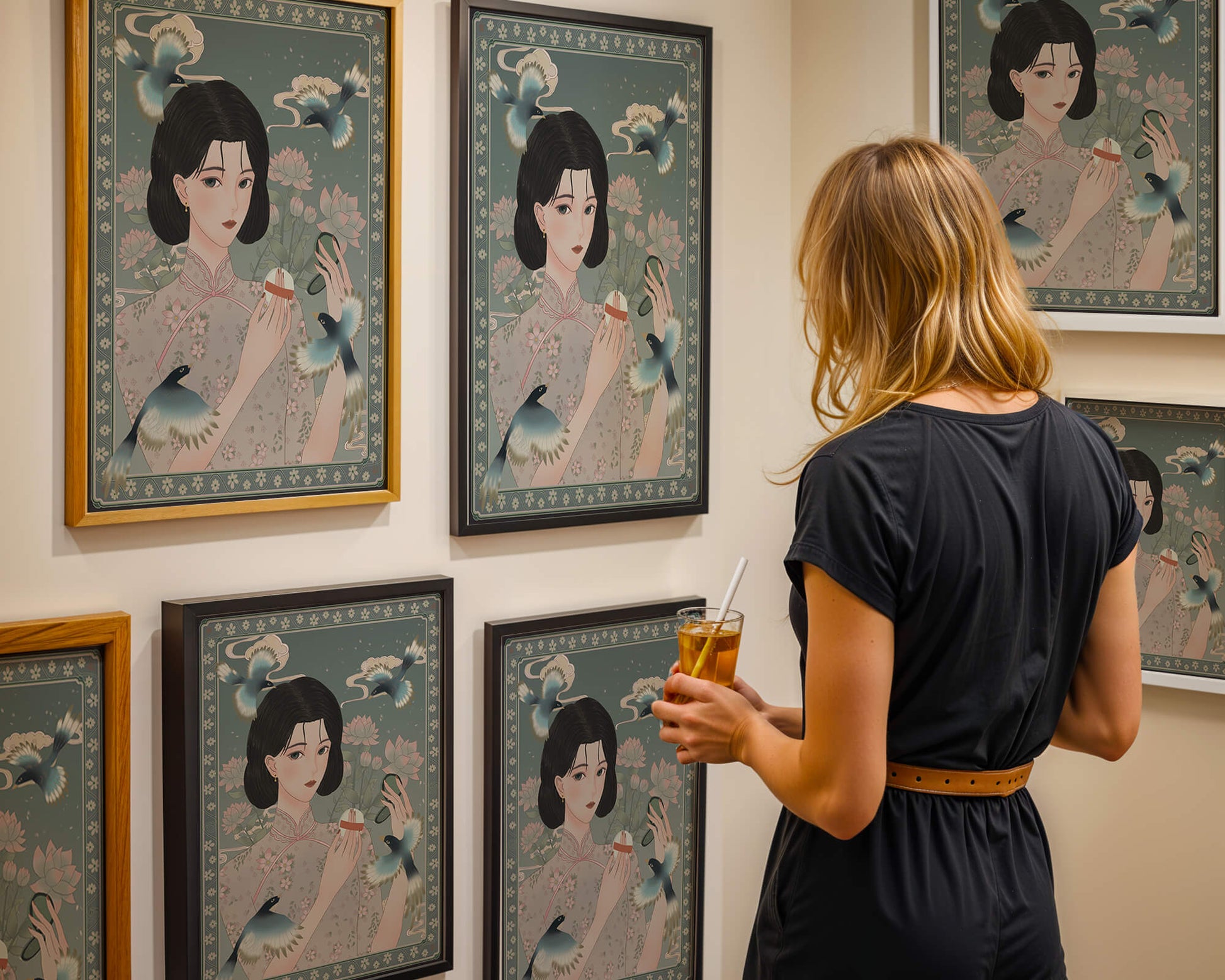 Elegant woman in floral kimono surrounded by birds and lotus flowers