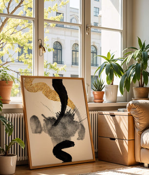 Abstract black and gold brushstrokes with textured patterns