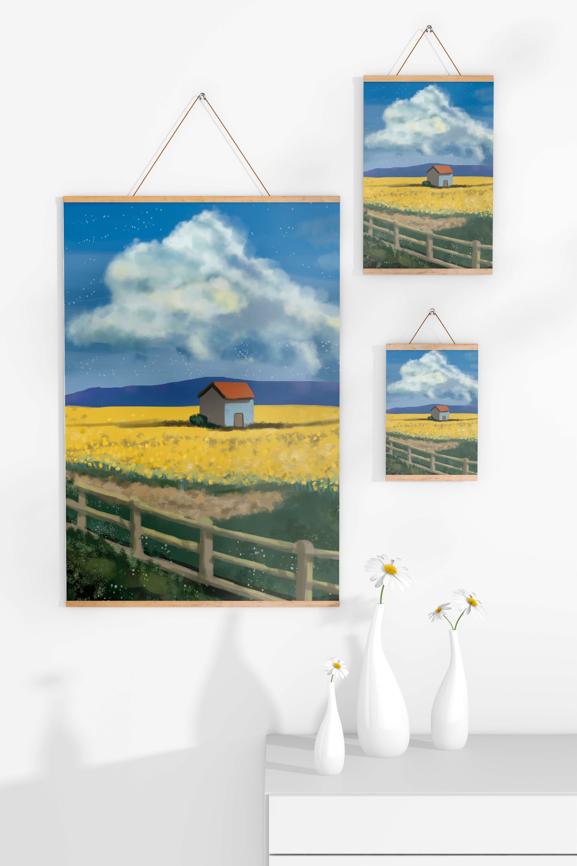 Idyllic rural scene with house and yellow field under blue sky