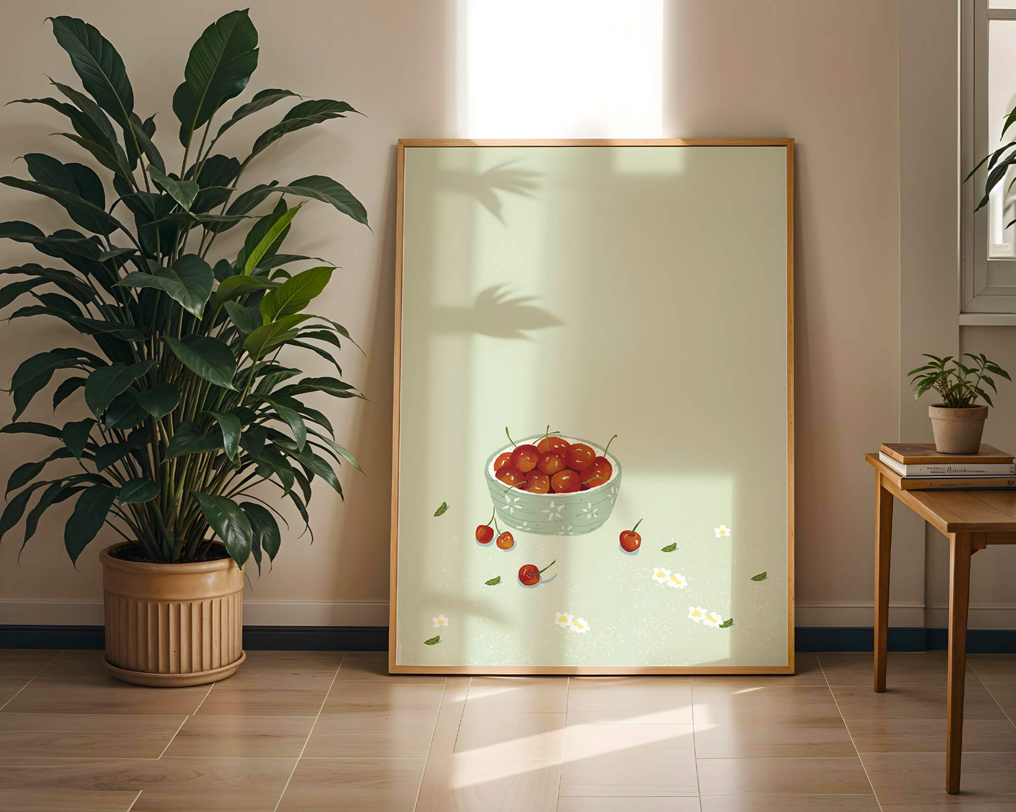 Cherries in a decorative bowl with floral accents on a soft green background
