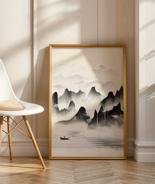 Peaceful mountain landscape with mist and rising sun