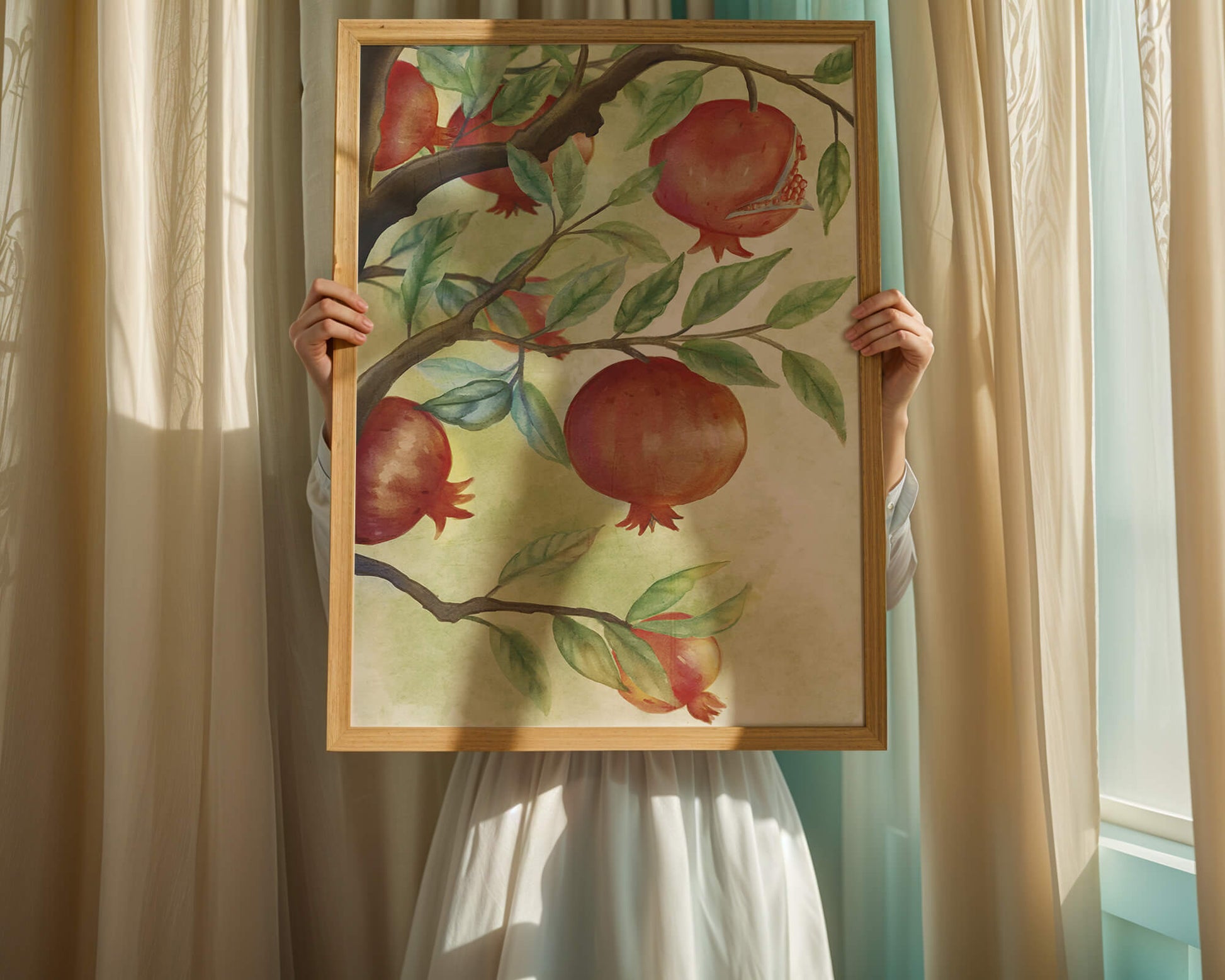 Watercolor illustration of pomegranates on a branch with leaves