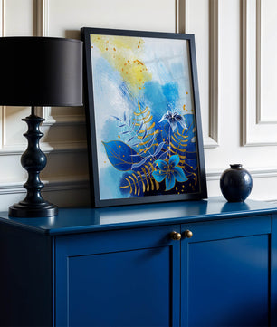 Floral illustration with blue leaves and golden accents on abstract background