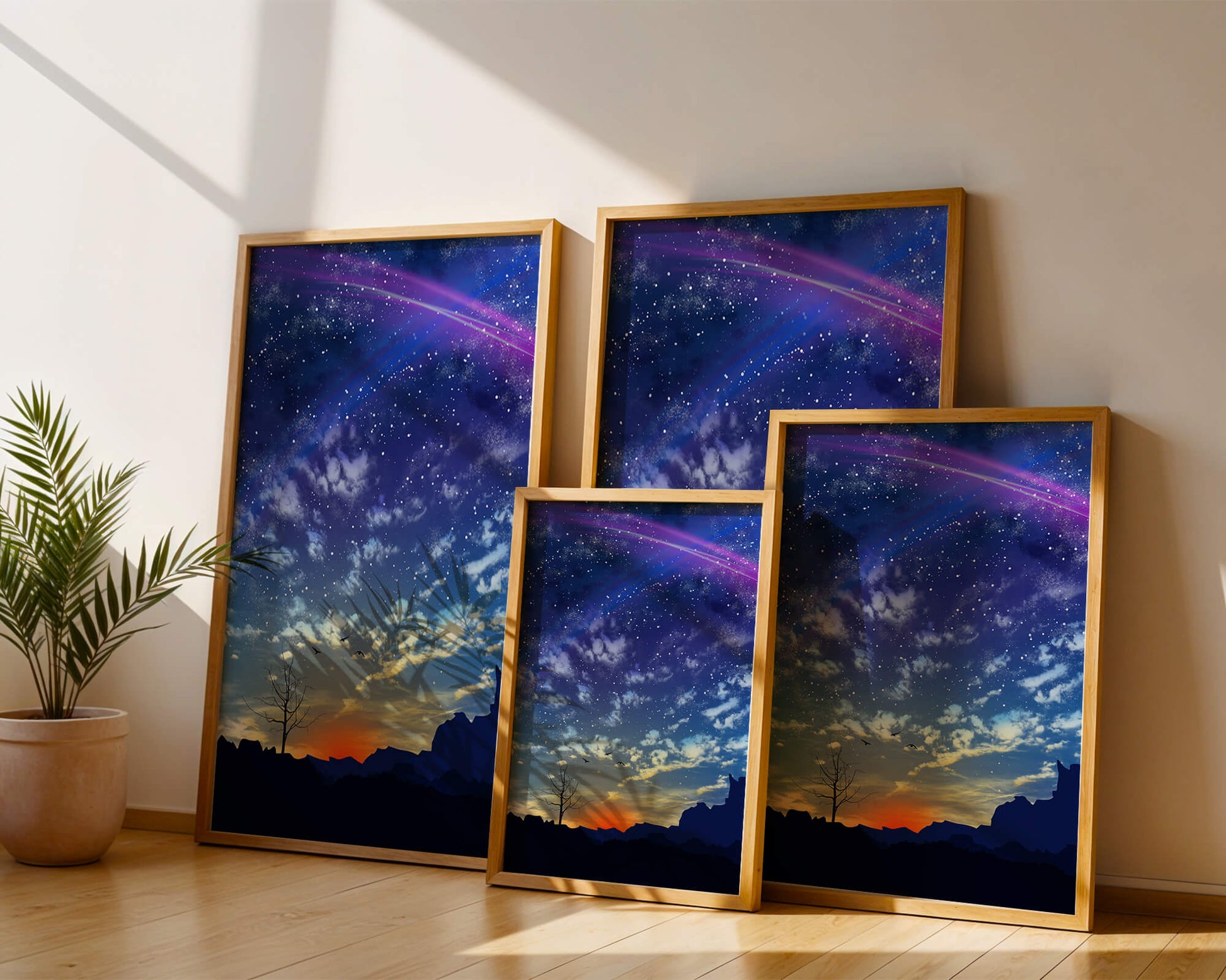 Starlit night sky with colorful sunset and silhouetted landscape