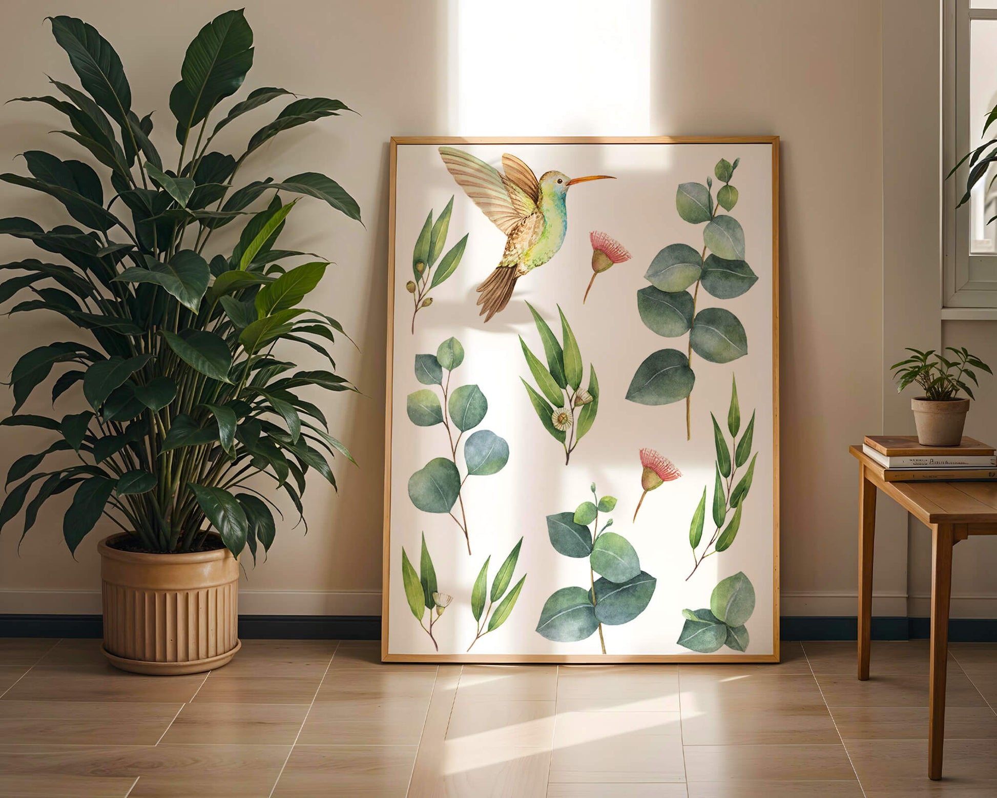 Watercolor hummingbird and eucalyptus leaves illustration