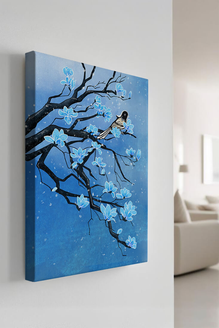 Bird on a branch with blue flowers against a snowy background