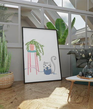 Cat Playing with Yarn Beside a Potted Plant on Pink Stool - Mi tienda