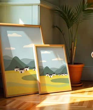 Pastoral Landscape with Mountains and Houses Under Blue Sky