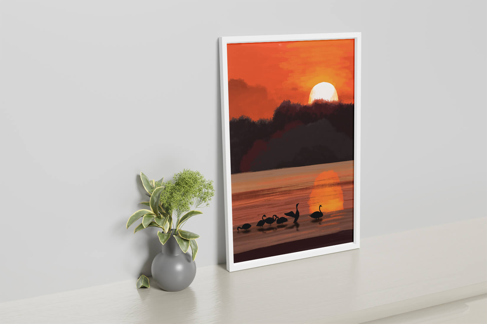 Serene sunset over a lake with silhouetted swans