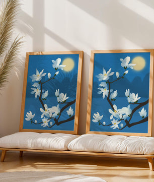 White magnolia branch under moonlight with blue background