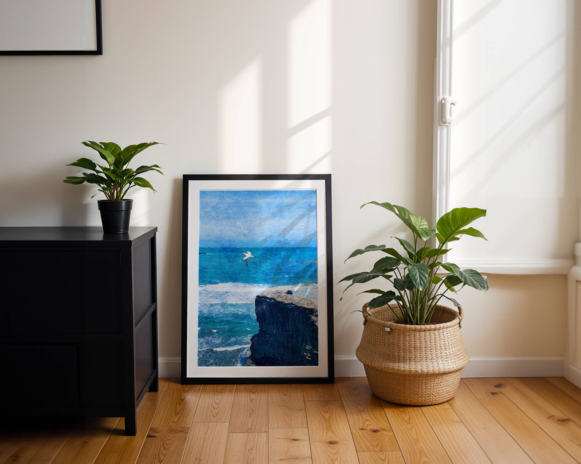 Seascape with soaring seagull over rocky cliff and ocean waves
