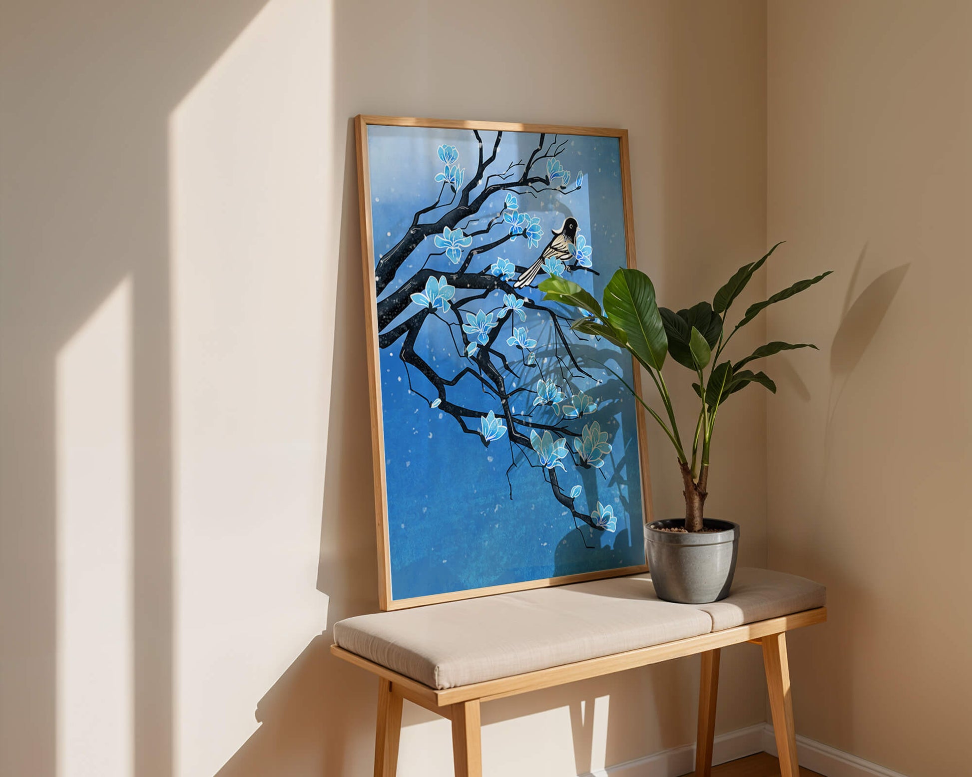 Bird on a branch with blue flowers against a snowy background