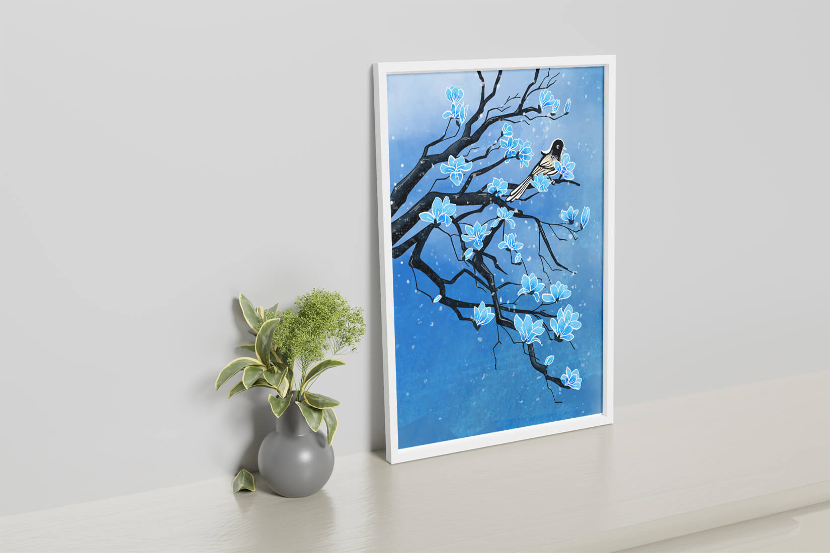 Bird on a branch with blue flowers against a snowy background