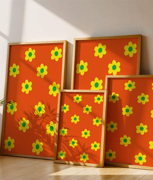 Buntes Blumenmuster mit gelben Blumen auf orangefarbenem Hintergrund