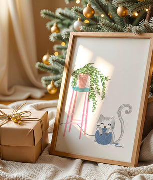 Cat Playing with Yarn Beside a Potted Plant on Pink Stool - Mi tienda