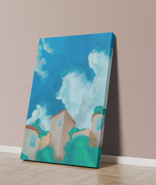 Serene landscape with houses and fluffy clouds against a blue sky