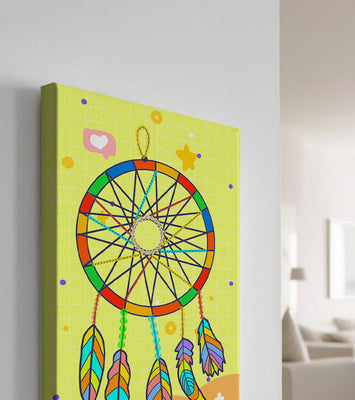 Colorful dreamcatcher on a vibrant yellow background