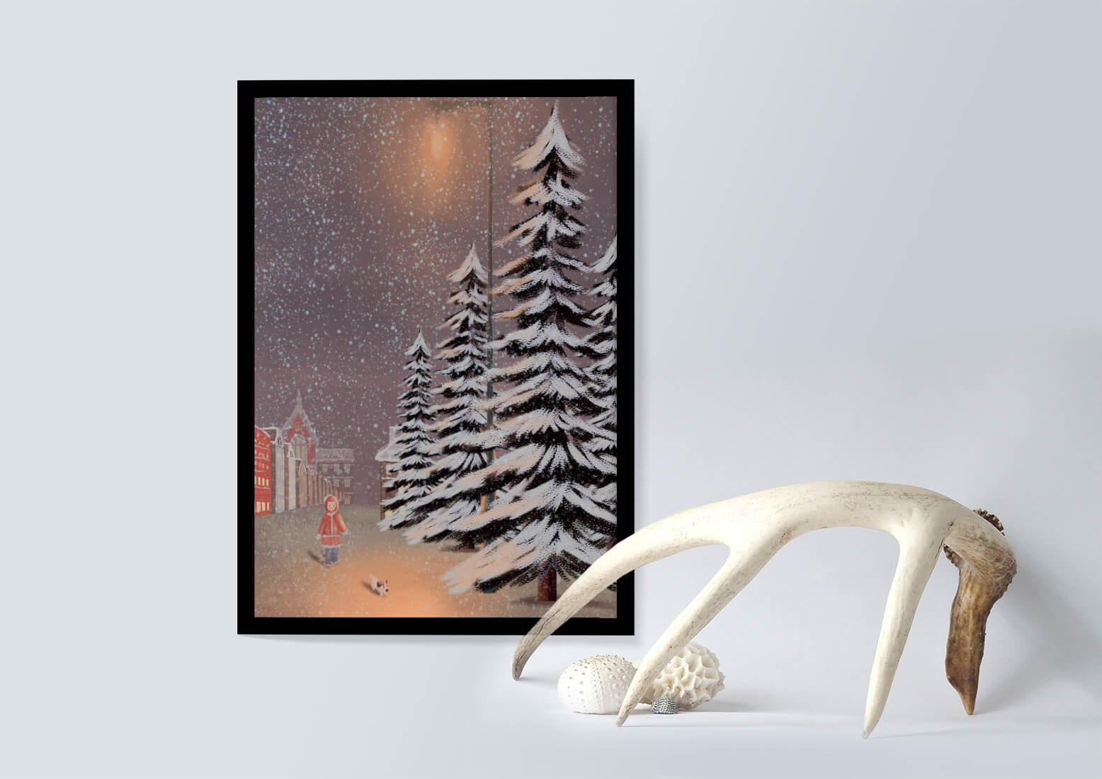 Snowy winter scene with a child and dog in a charming town