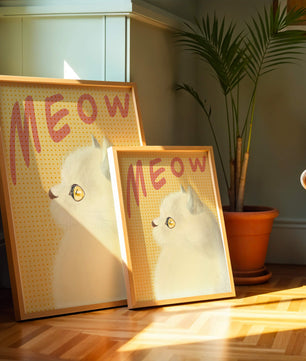 Profile View of a White Cat with Meow Text on Yellow Background
