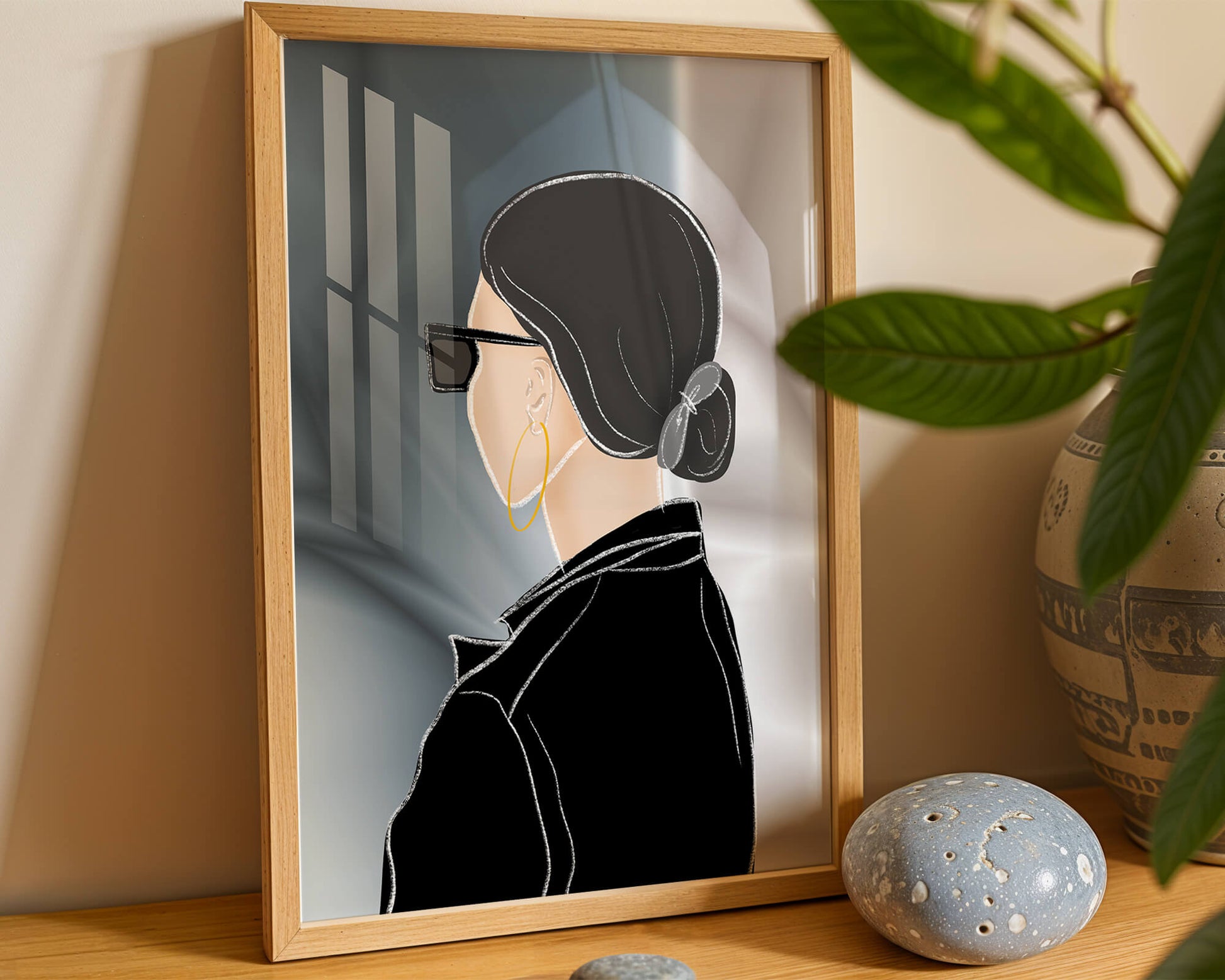 Modern woman with sunglasses and gold hoop earrings