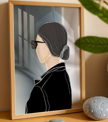 Modern woman with sunglasses and gold hoop earrings